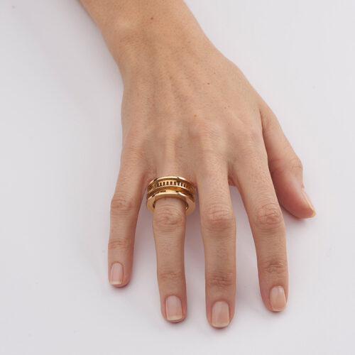 model wearing chunky yellow gold cocktail ring