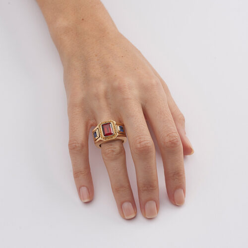 model wearing statement garnet and sapphire cocktail ring
