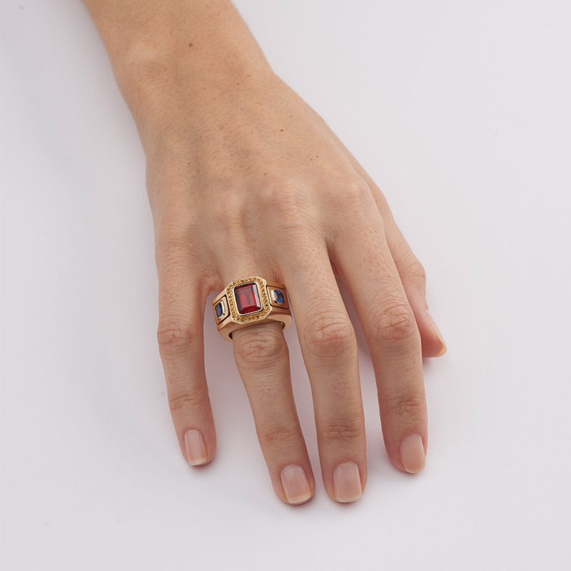 model wearing statement garnet and sapphire cocktail ring