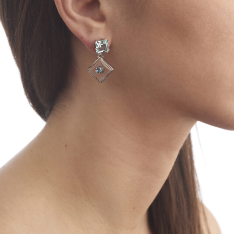 model wearing aquamarine earring
