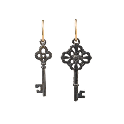 Brass key earrings on gold hoops