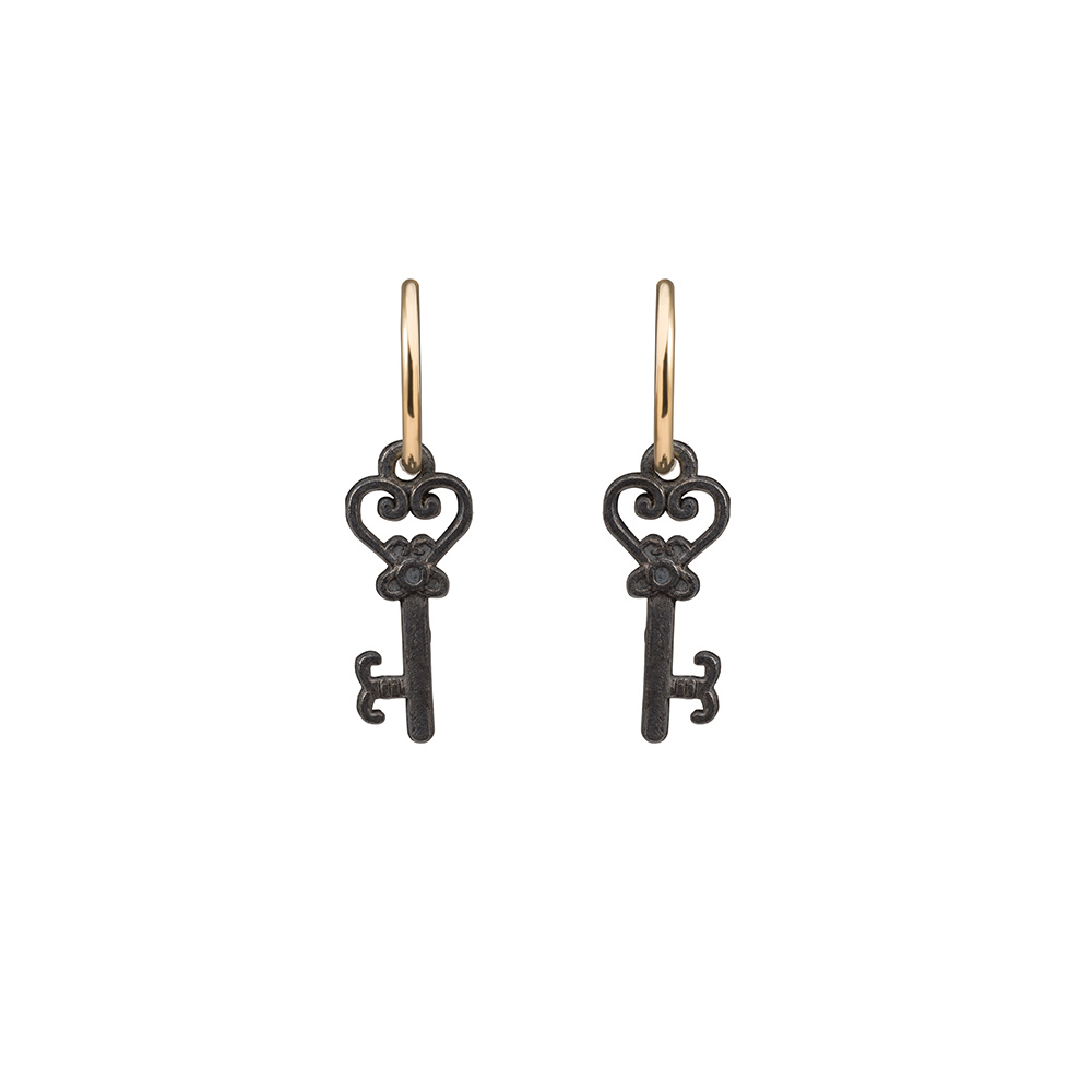 brass key earrings on gold hoops