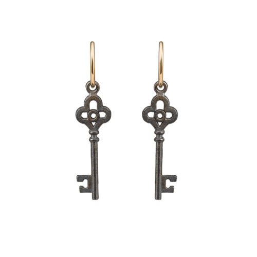 brass key earrings on gold hoops