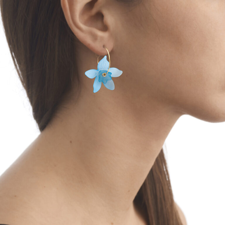 blue flower earrings on model