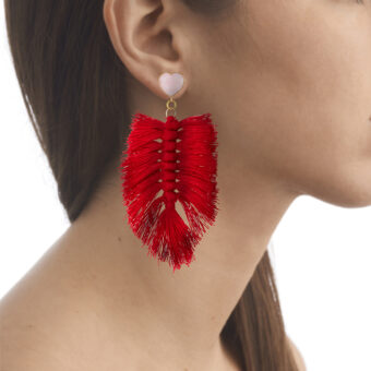 red tassel earring on model