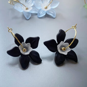 white and black flower earrings